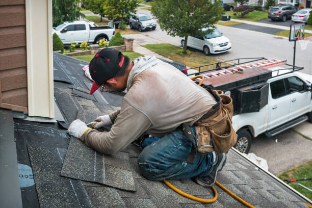 Professional Roofing technician working in Woodward, PA